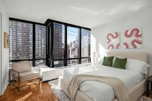 Photo #9 of Sutton Heights | 20th-floor 2BR w/Doorman, Gym, and Pool Photo #9 of Sutton Heights | 20th-floor 2BR w/Doorman, Gym, and Pool