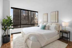 Photo #5 of Sutton Heights | 20th-floor 2BR w/Doorman, Gym, and Pool Photo #5 of Sutton Heights | 20th-floor 2BR w/Doorman, Gym, and Pool