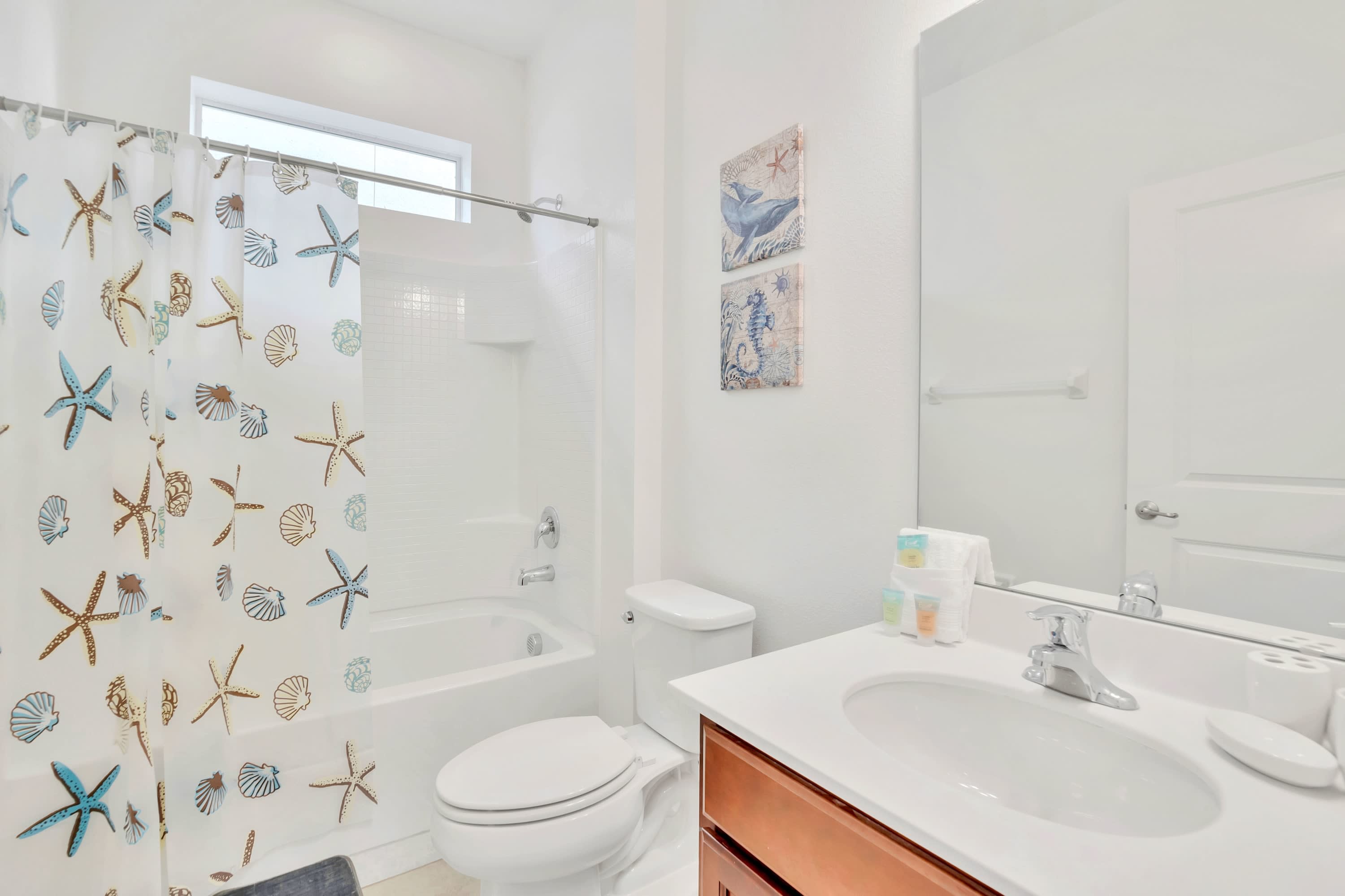 A well-appointed bathroom equipped with modern fixtures and crisp towels