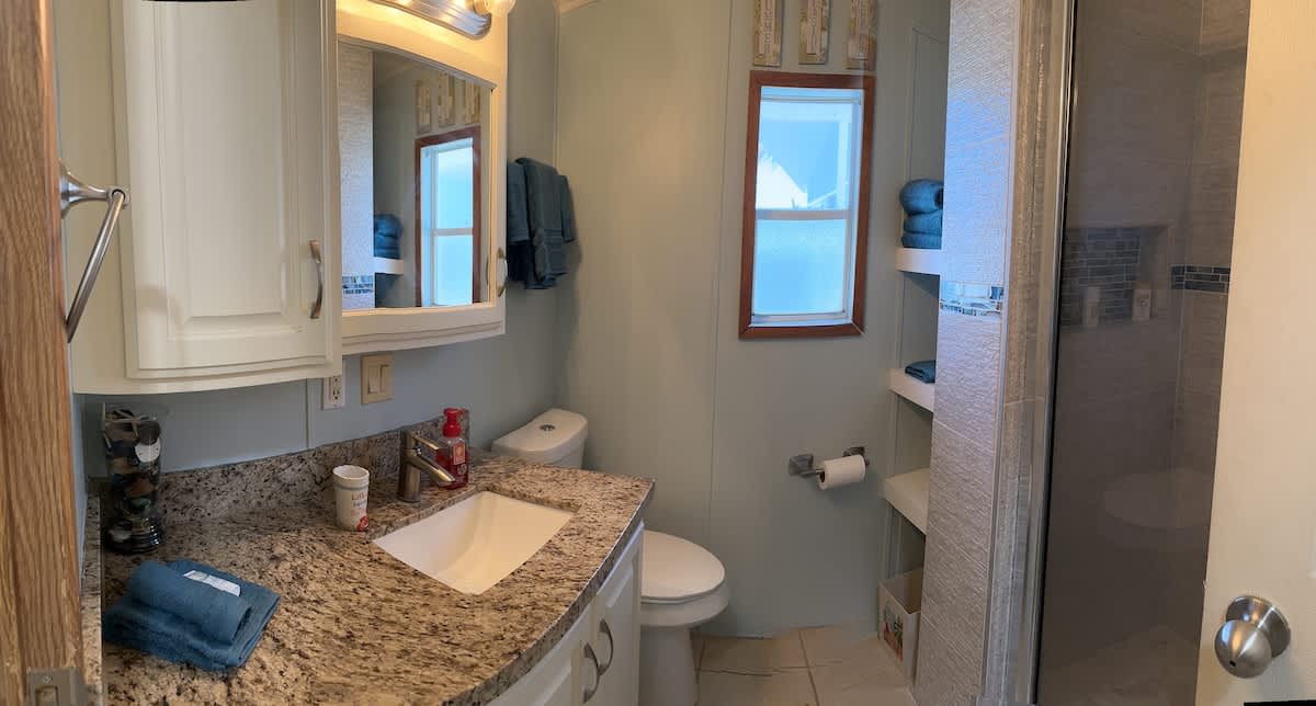 Full bathroom with a standing shower.