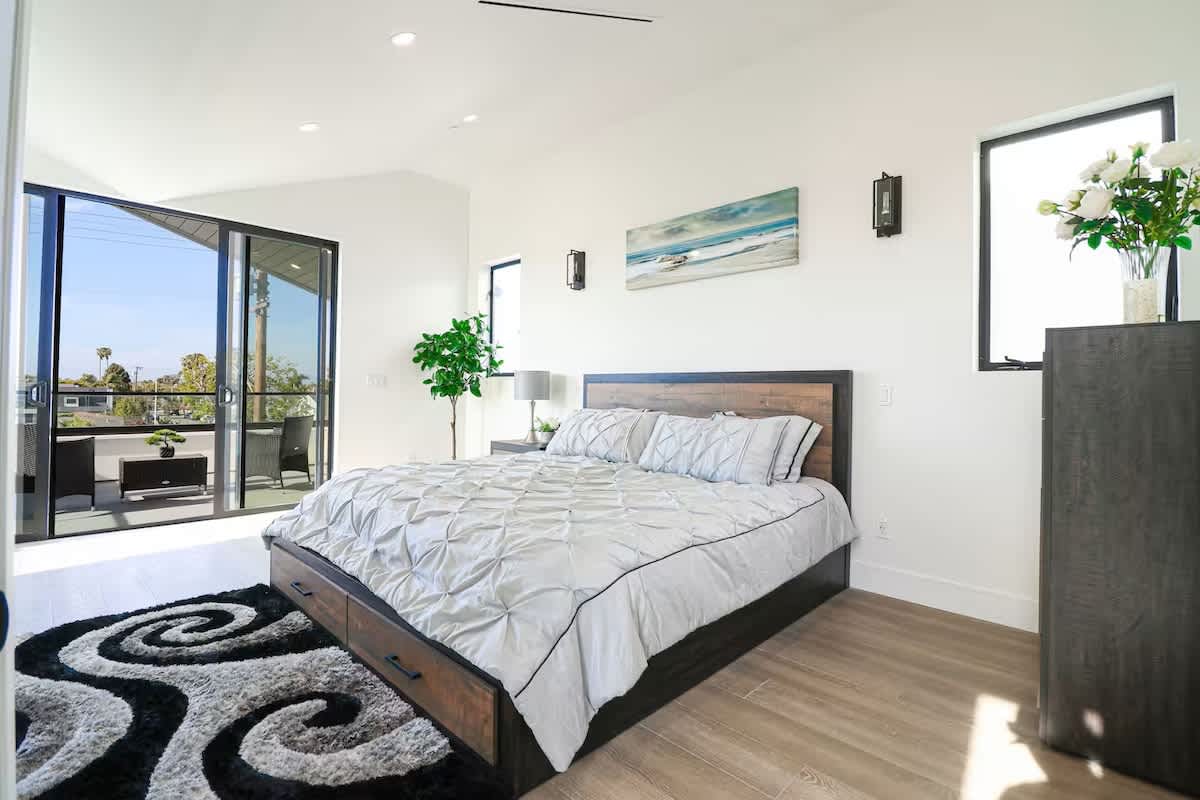 Master Bedroom with 65 inch Smart Samsung TV