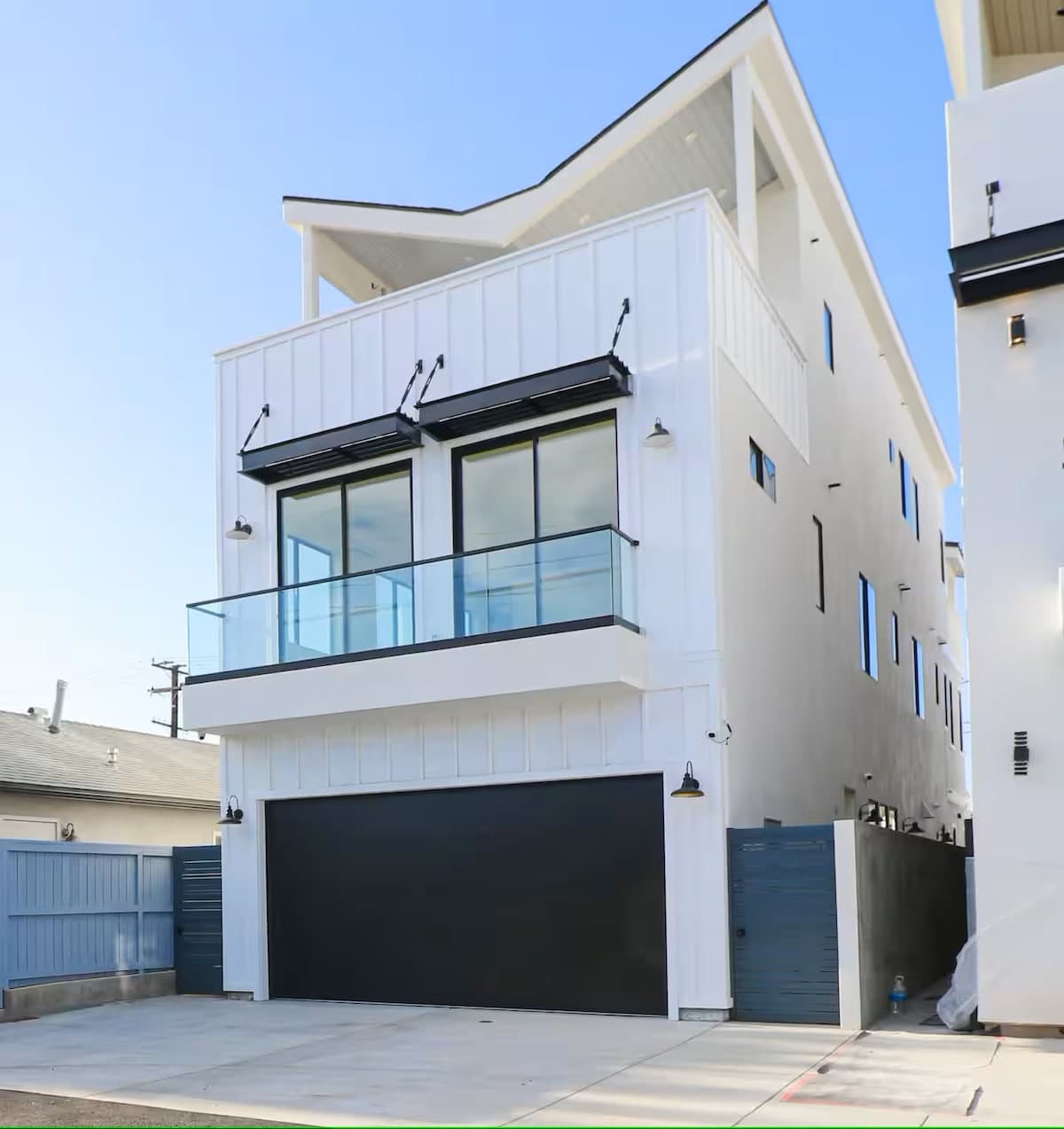 Rear of the home. Onsite parking for guest. Please park on the left side of the garage near the trash cans.