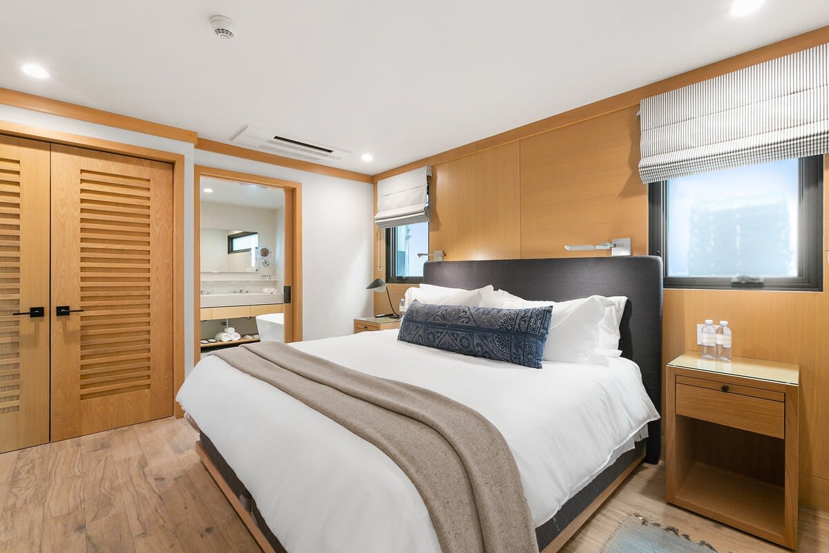 King sized fully outfitted with high quality linens and down comforter for a dreamy sleep