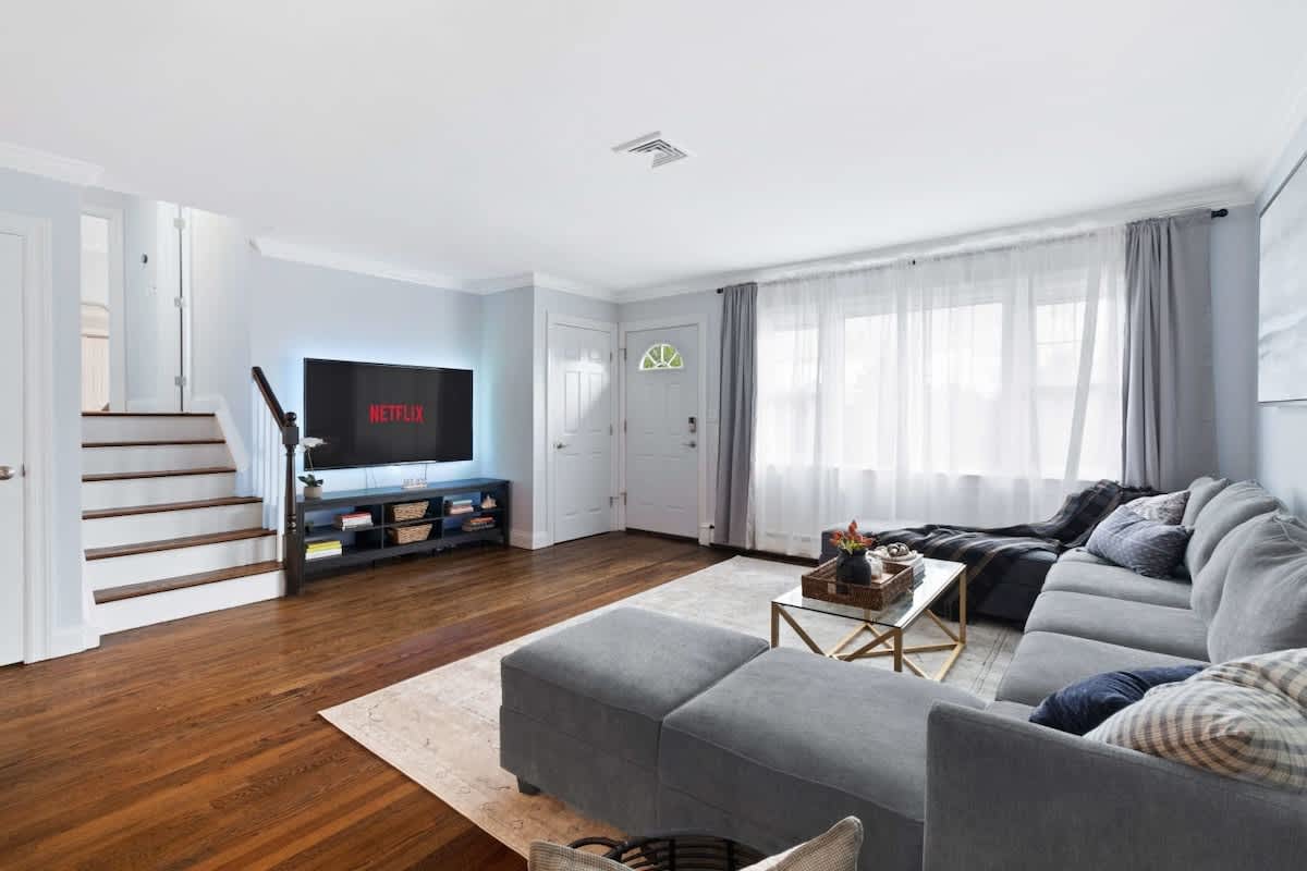 Spacious living room with 70 Inch Smart TV