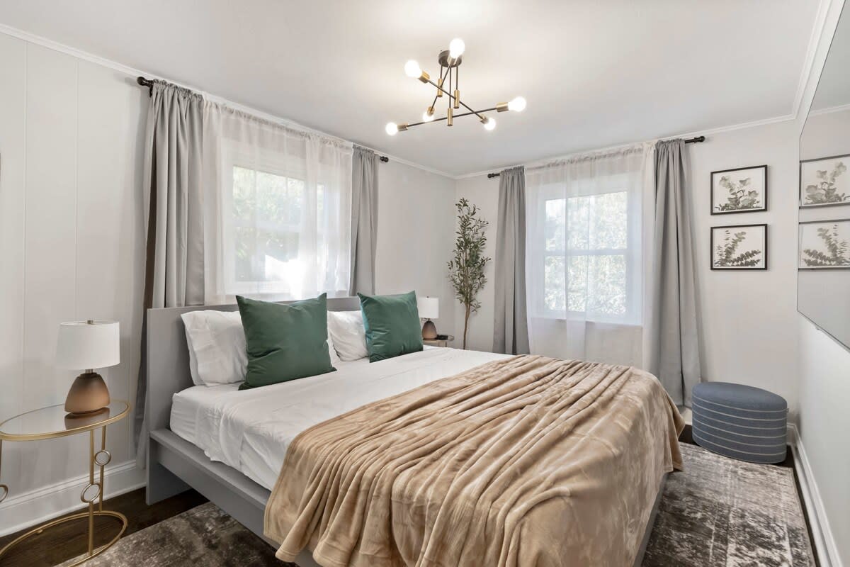 Forth bedroom with king size bed. Located on the first level, next to the pool room