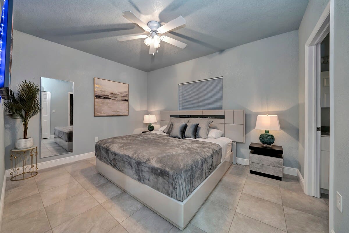 Second master bedroom, with 55' TV in suite bathroom