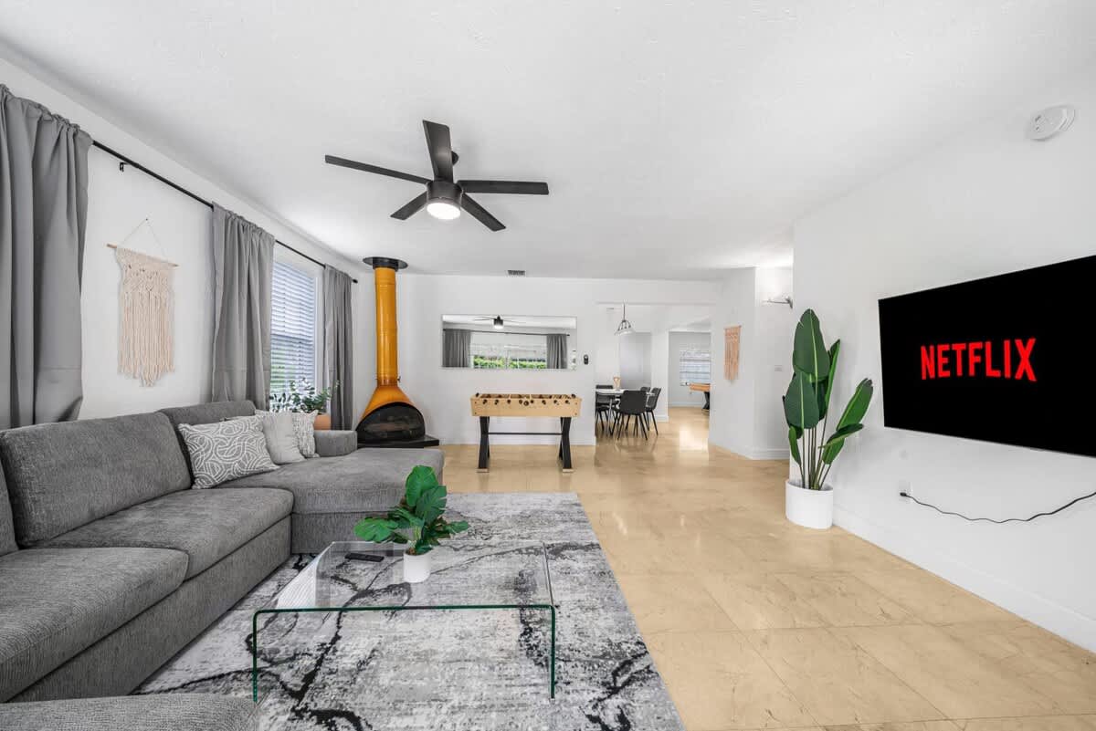 Open living room with 70" Smart TV