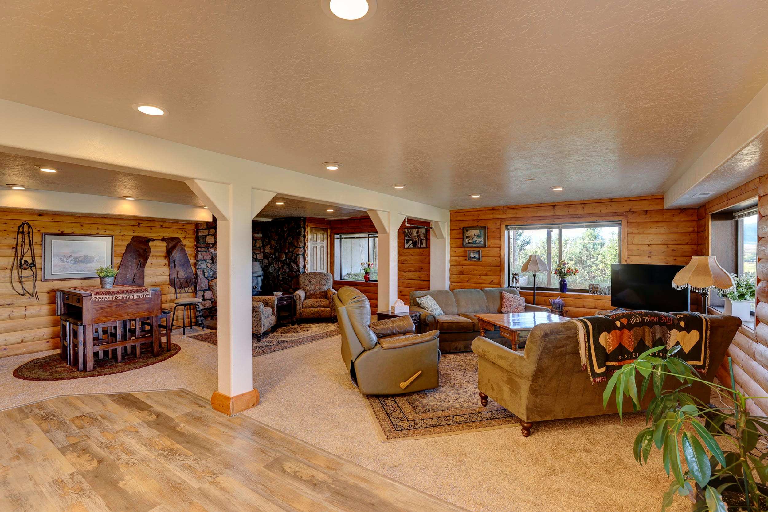 Panorama | Sweeping Bighorn Mountain Views | Spacious 3-Bedroom Walk-Out Retreat | Renovated Spa Bathroom | Western Living Room with Log Accents | Sheridan Wyoming Vacation Rental — Sheridan, WY — vacation rental