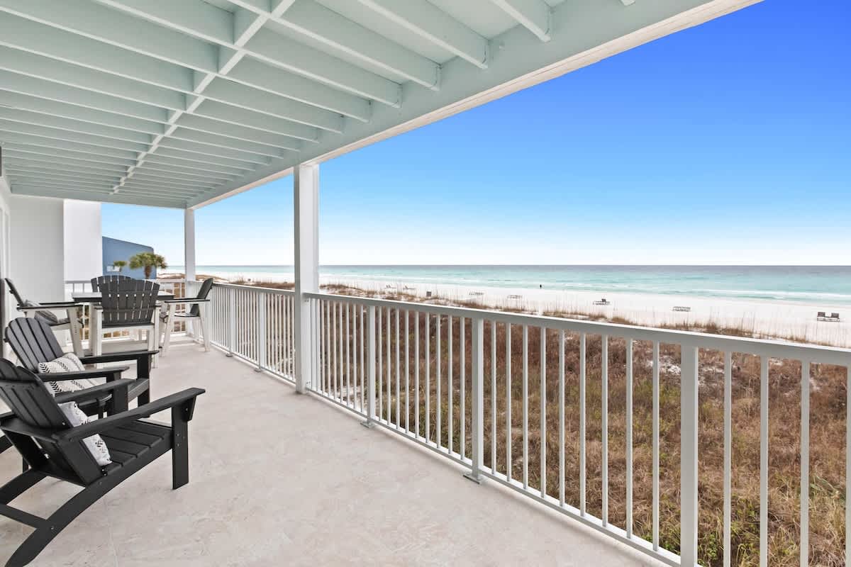 Patio: Private patio, 8-person outdoor dining with ocean and beach views.