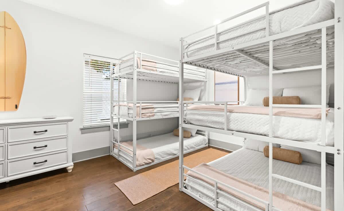 Bedroom 3: 3 full beds, 3 twin beds, 42" Smart TV, upper floor 