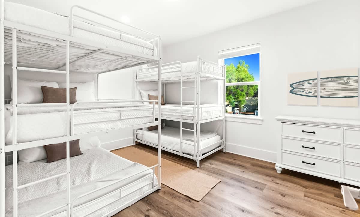Bedroom 4: 3 full beds, 3 twin beds, Smart TV [upper floor] 