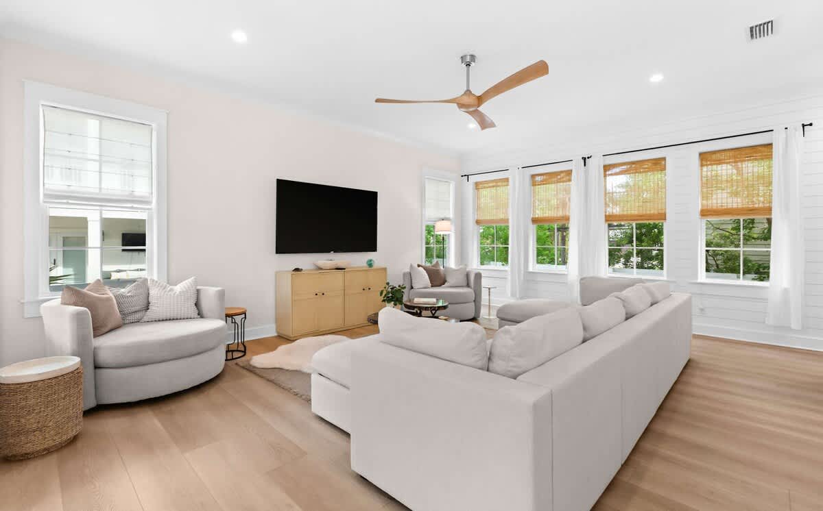 Living room: Smart TV, sectional seating, main floor 