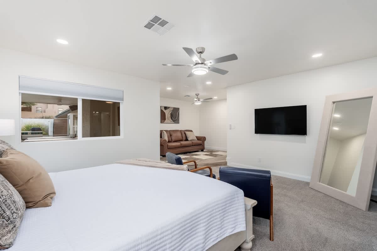 Your spacious suite combines restful sleep with a full lounge area, complete with cozy seating and a large TV for your favorite shows and downtime.