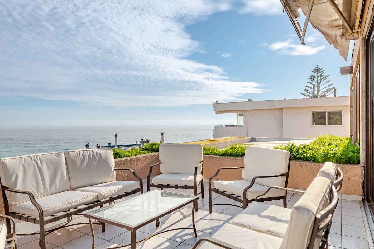Relax on this stunning patio with breathtaking ocean views, perfect for unwinding and enjoying the coastal breeze.