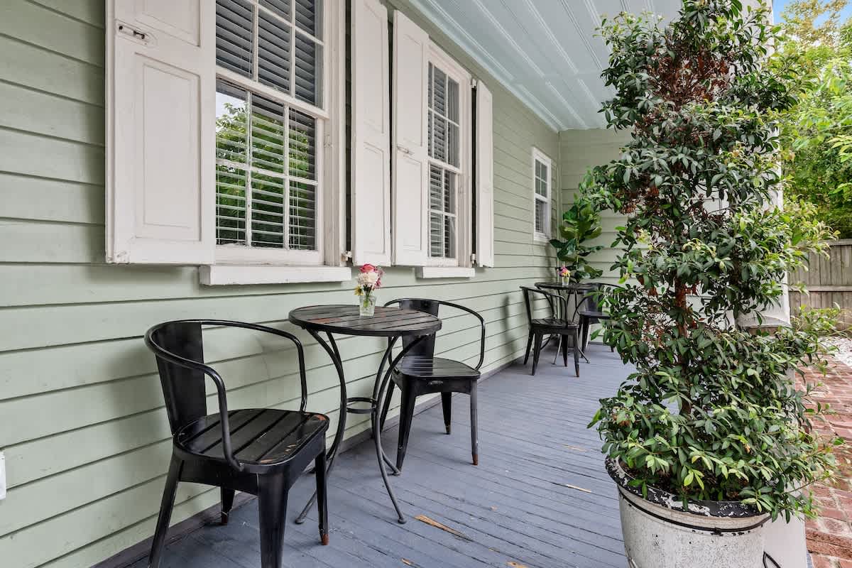 Additional outdoor seating on the first floor balcony. 