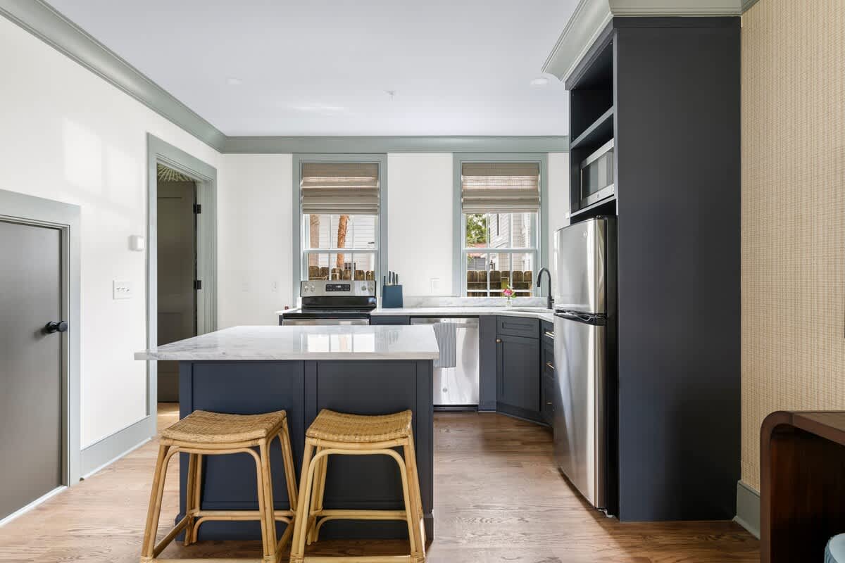 Fully equipped kitchen with seating for two on the island