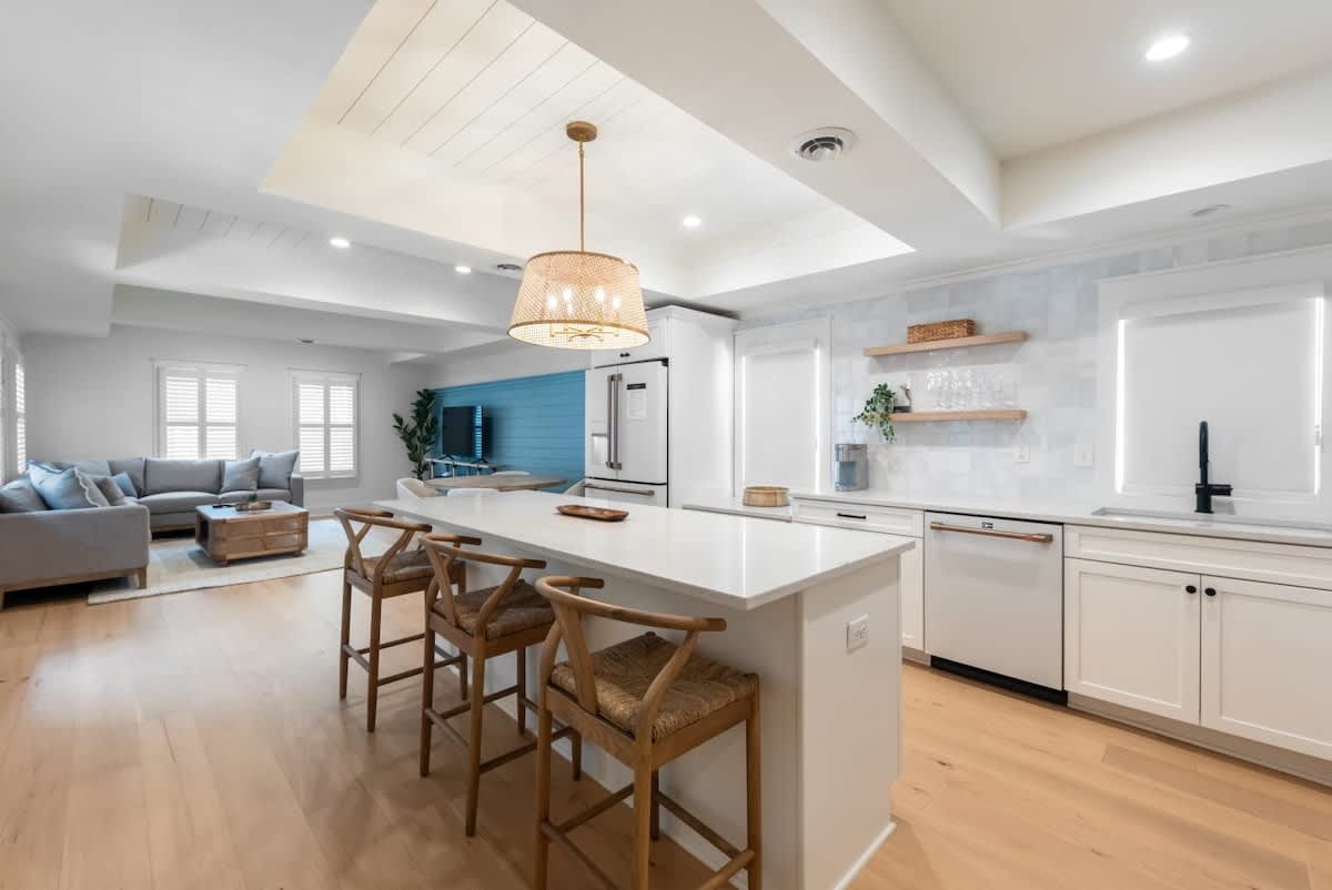 Have a few drinks at the kitchen island while watching the designated chef in action.