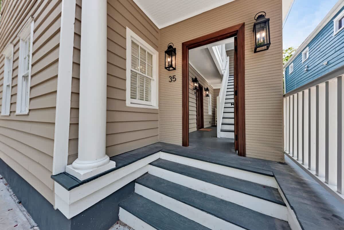 Hop across four stairs and enter your Charleston relaxation oasis.