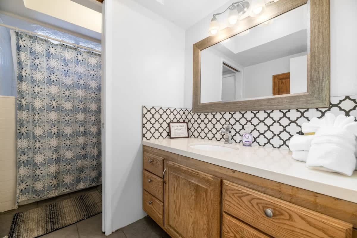 First Full bathroom between master and 2nd bedroom.