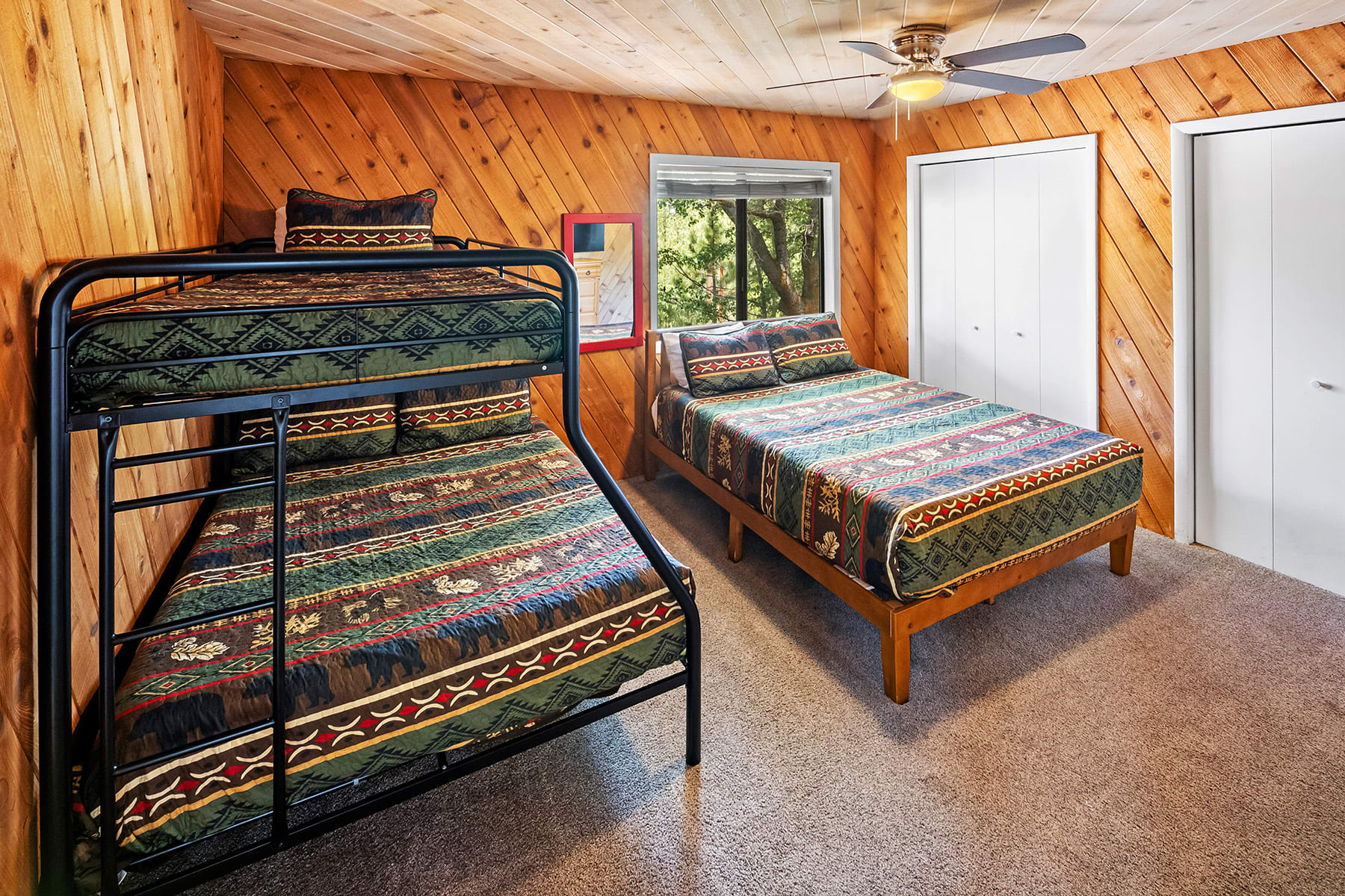 2nd bedroom with a Queen bed and twin-over-full bunk.