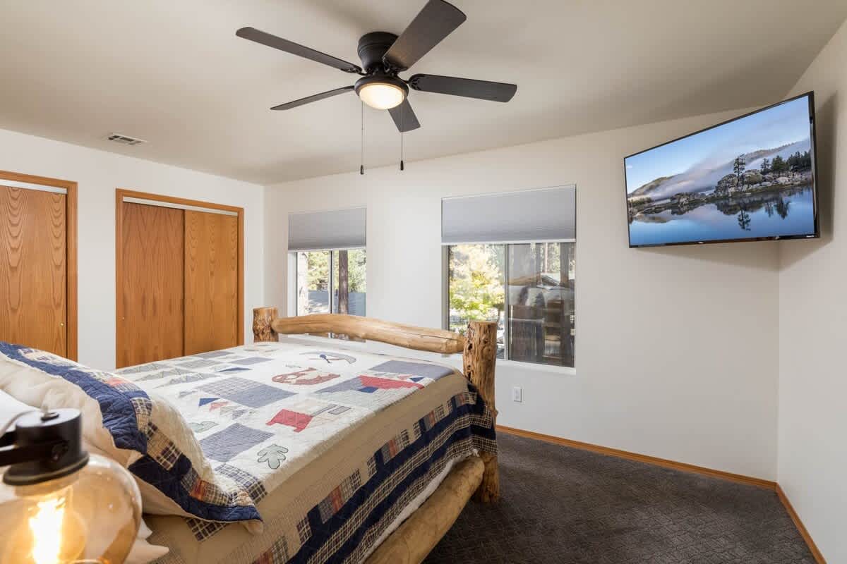 Master Bedroom with California King bed and Roku Smart LCD TV.