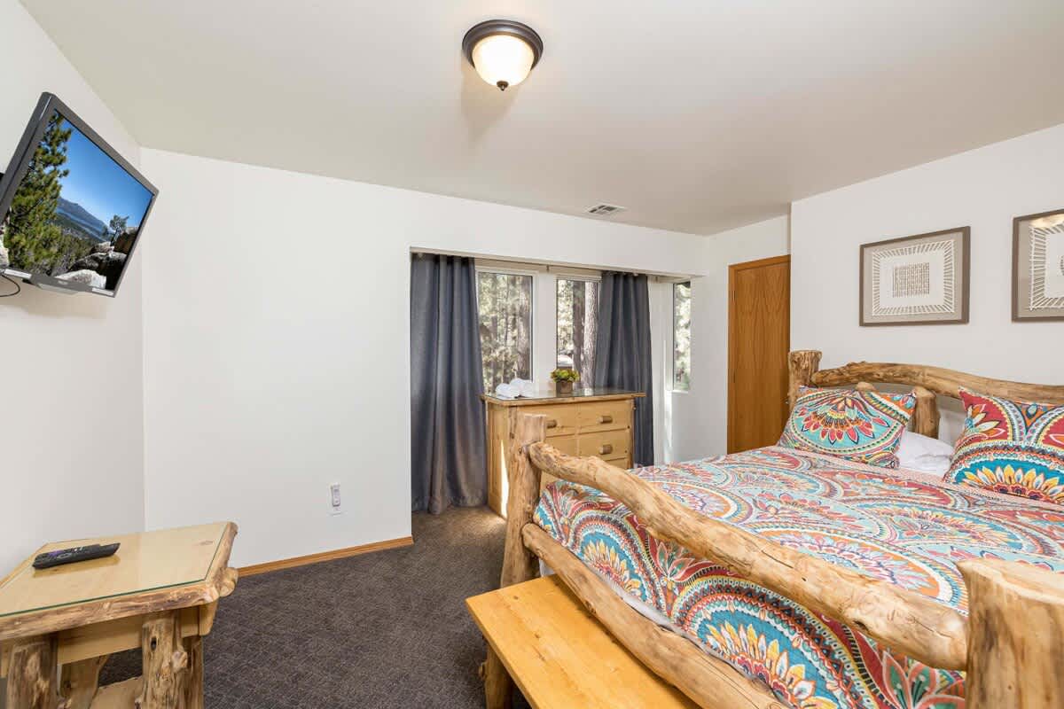 3rd comfortable Bedroom. Queen Log Bed, Roku TV, Walk in Closet.