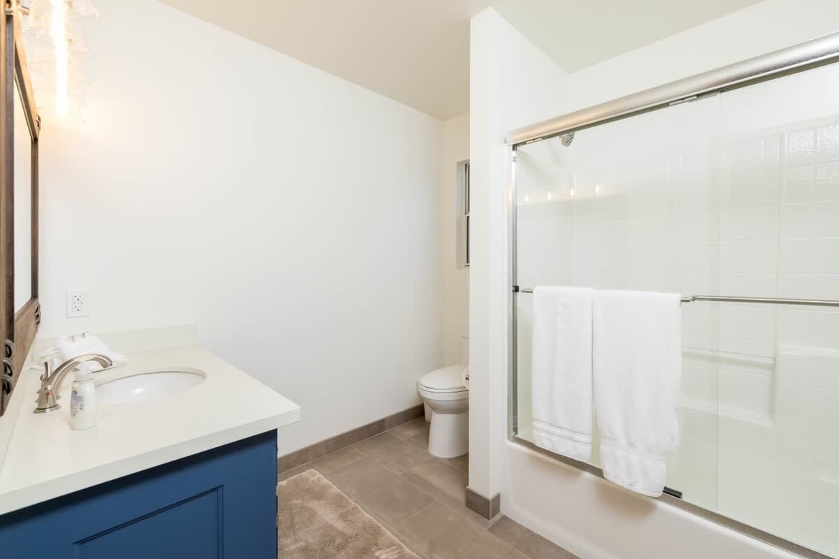 3rd beautiful bathroom downstairs by living area.