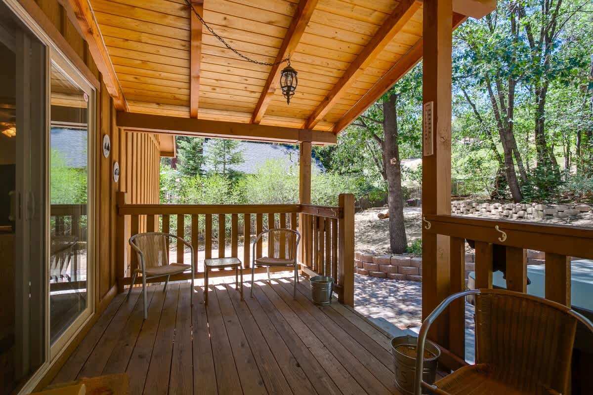 Private covered deck by the hot tub