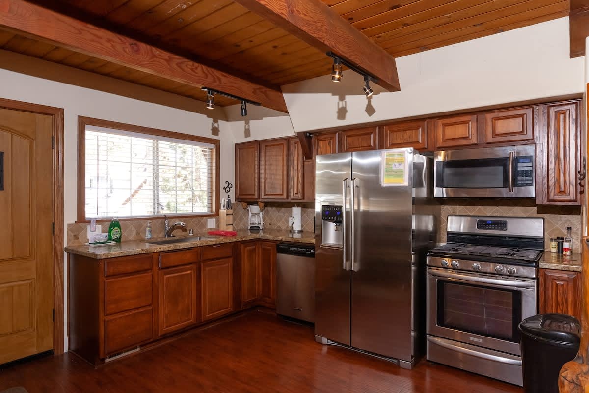 Granite kitchen with stainless appliances