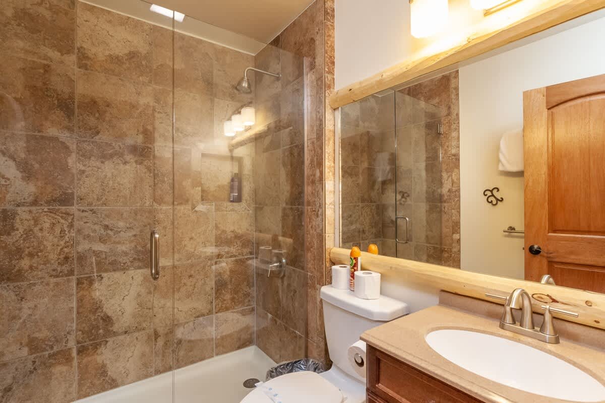 Bathroom with tiled glass shower