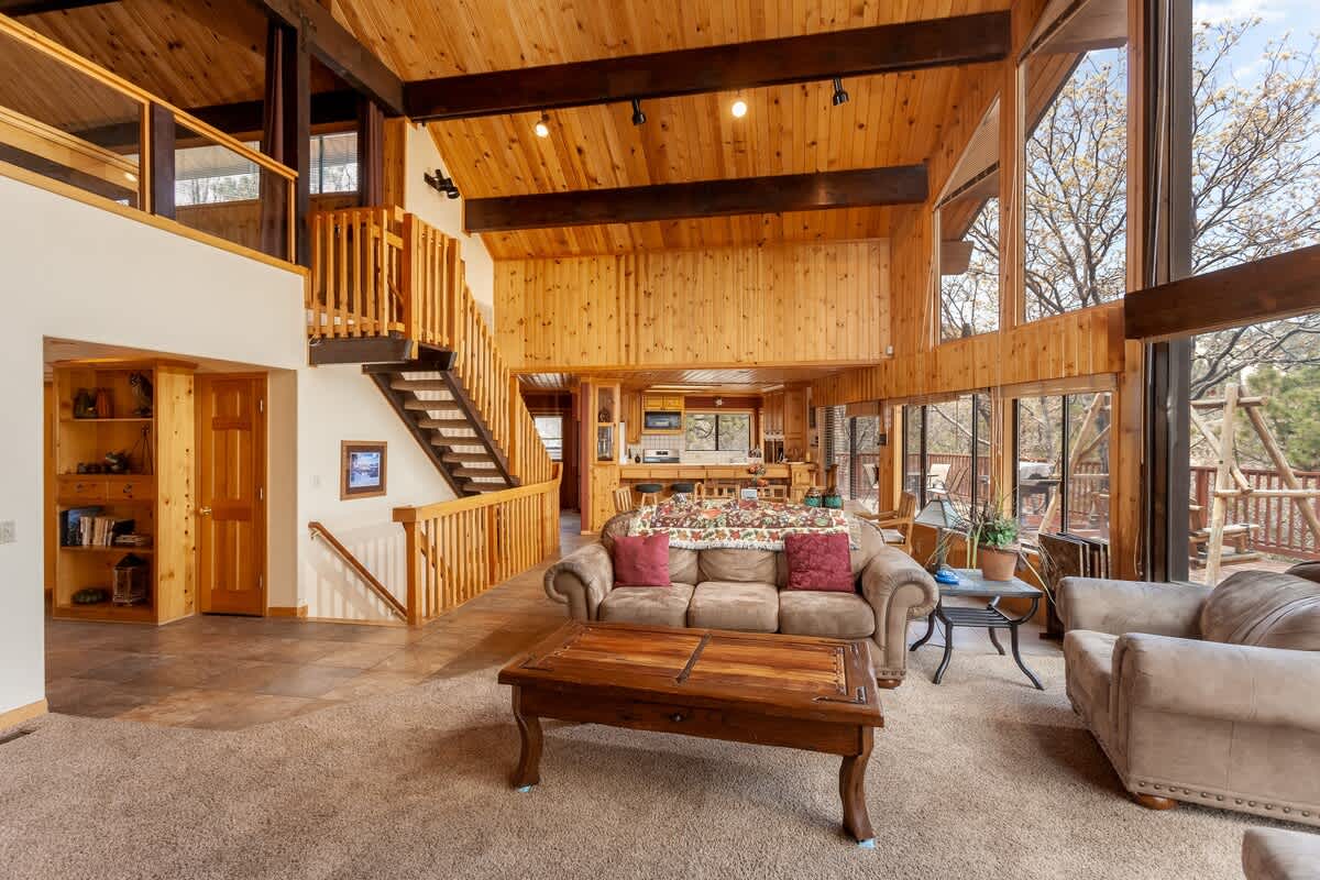 Open living room leading to the dining area and kitchen
