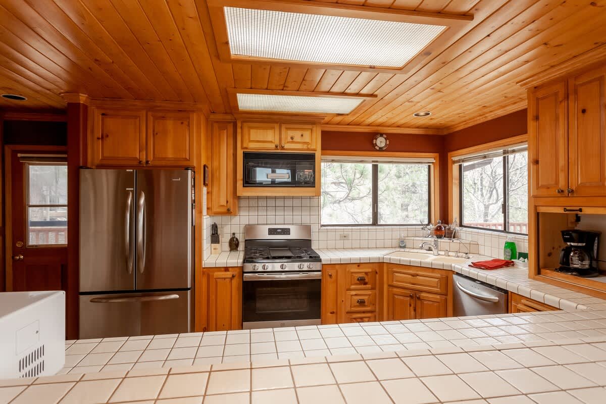 Fully equipped kitchen with stainless appliances
