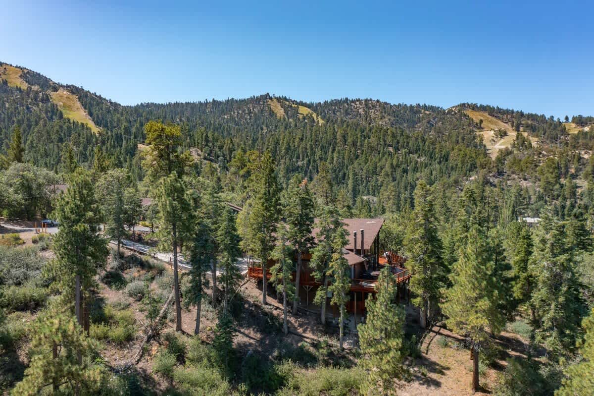 Tucked into the pines below the ski slopes