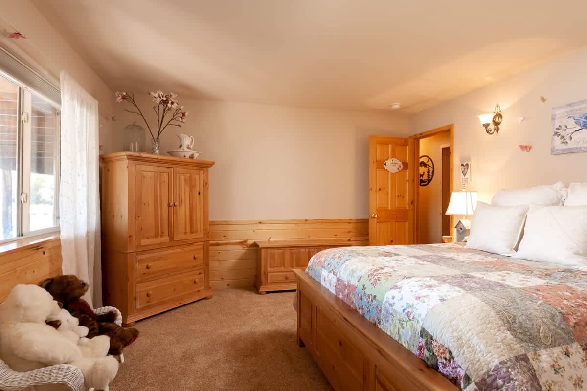 Queen bedroom with TV