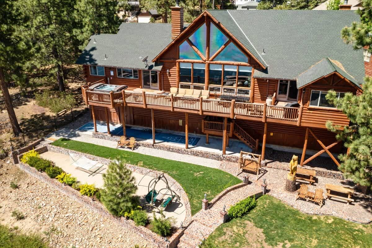 Aerial view of the estate and lakeside deck