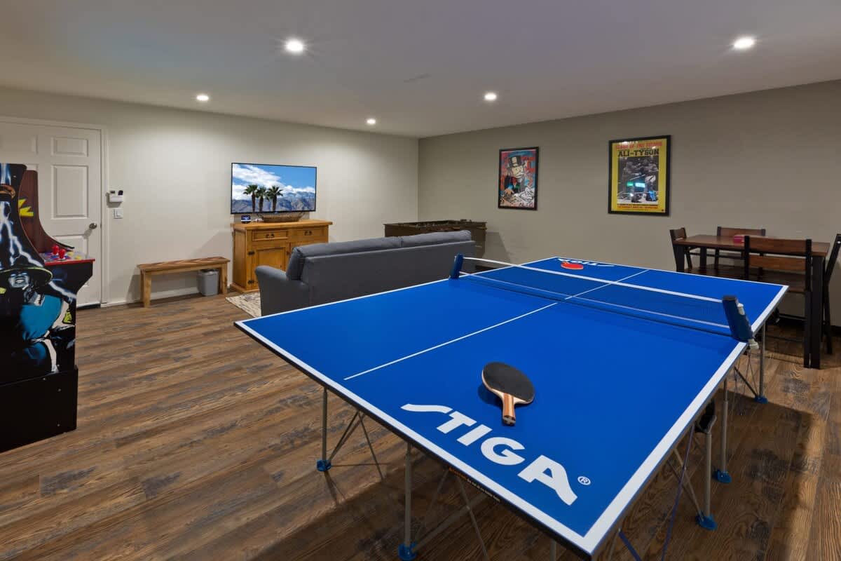 Game room ping pong table and arcade games.