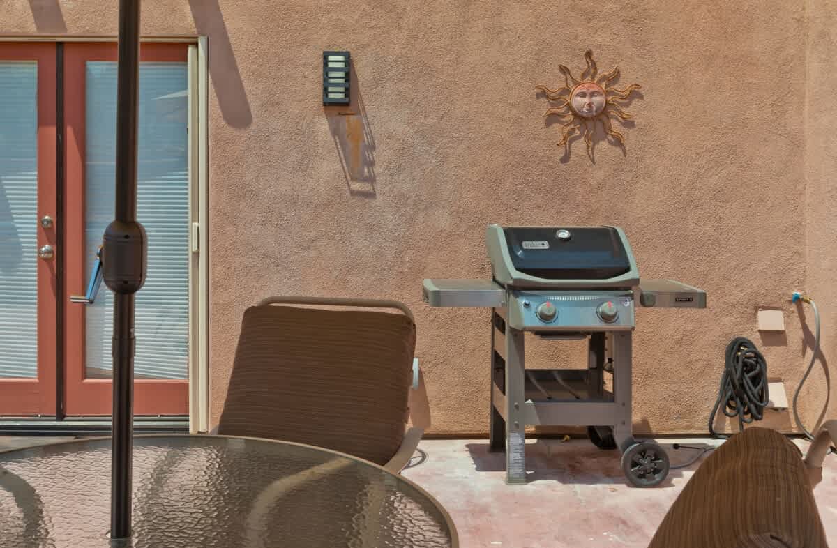 For the outdoor chef nice weber bbq and seating al fresco.
