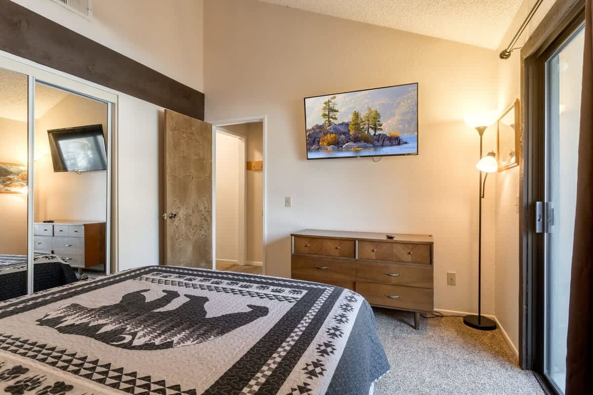 Huge Smart Roku LCD TV in Master Bedroom.