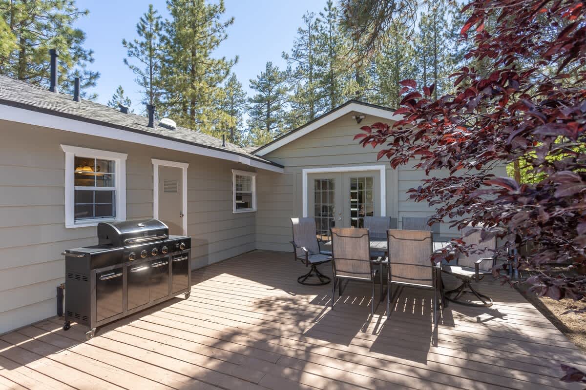 Backyard deck with BBQ and outdoor dining