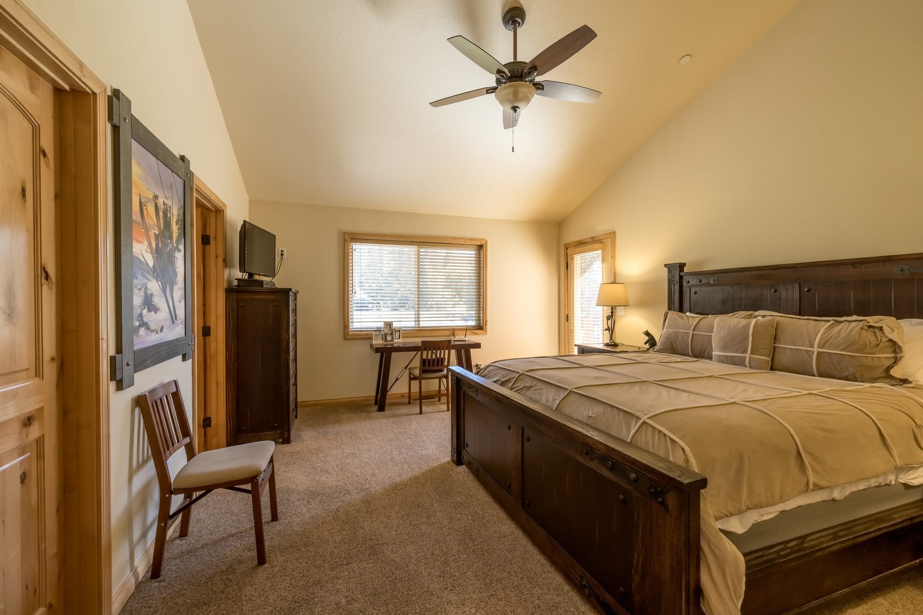 Primary bedroom with King bed and smart TV