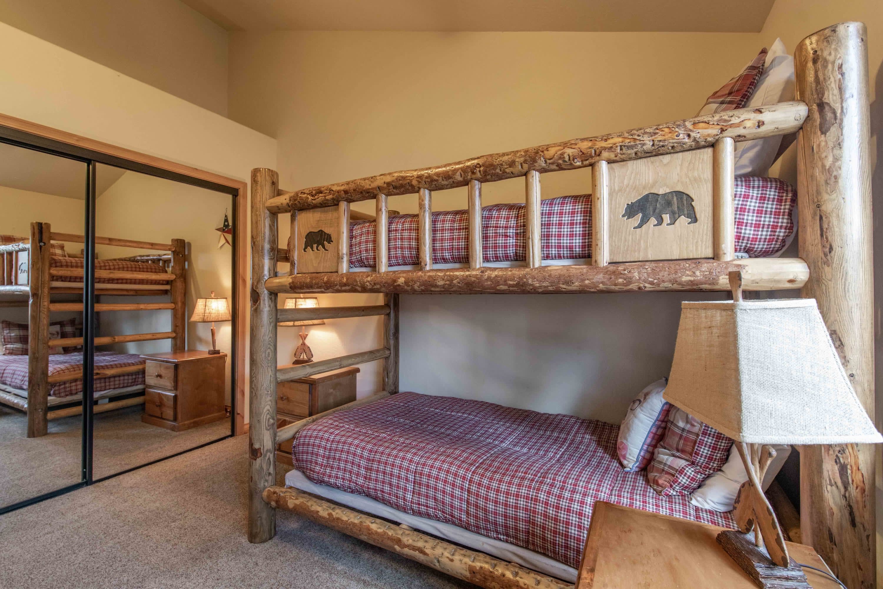 Log bunk beds in the third bedroom