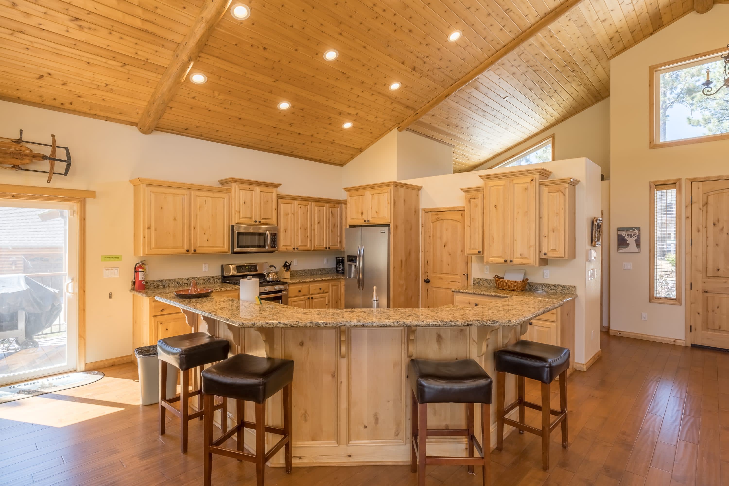 Breakfast bar at the granite kitchen island
