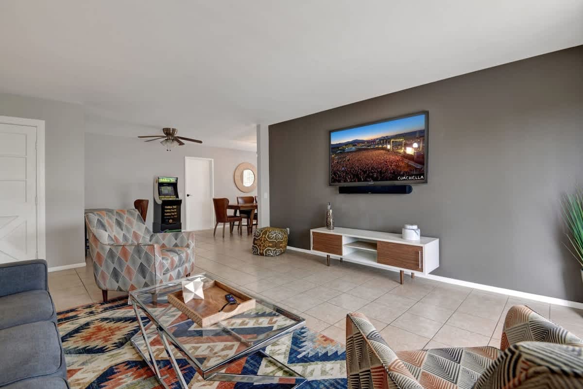 Huge Smart TV in comfortable living room.