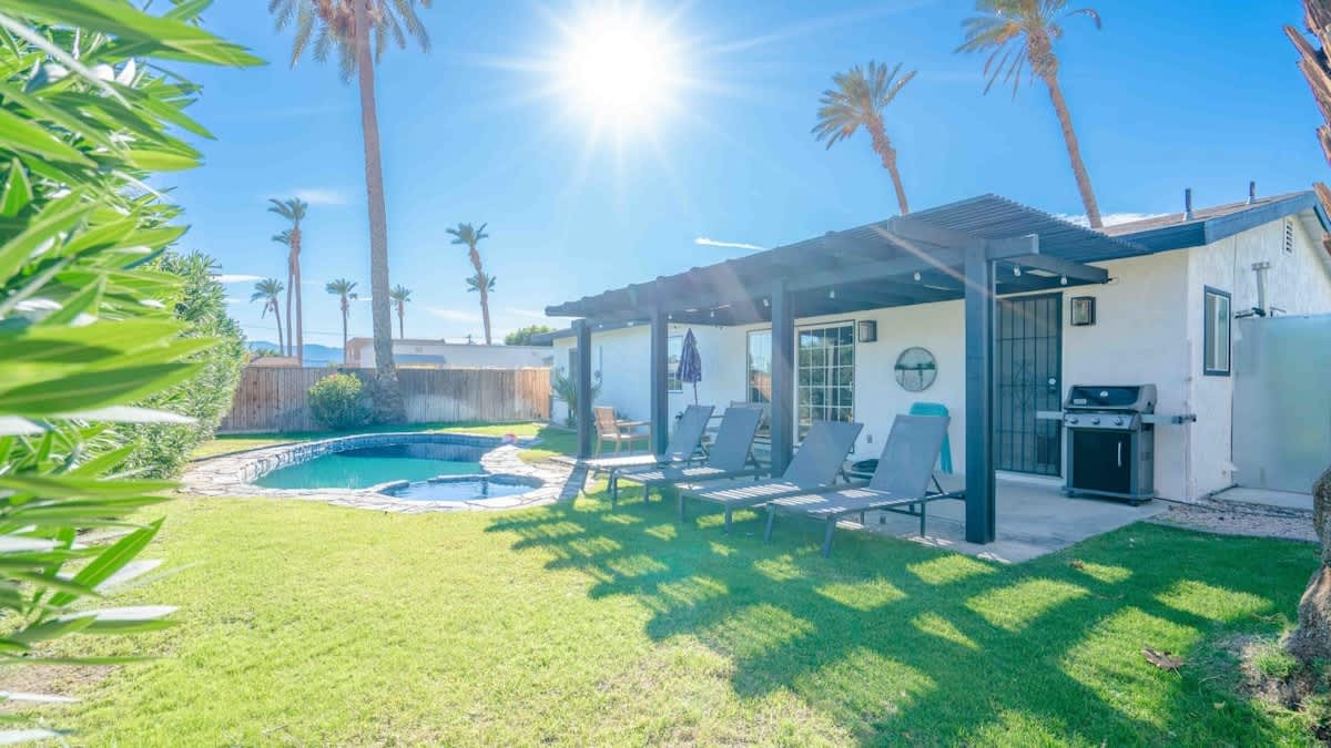 Private pool, spa and lawn with Weber BBQ.