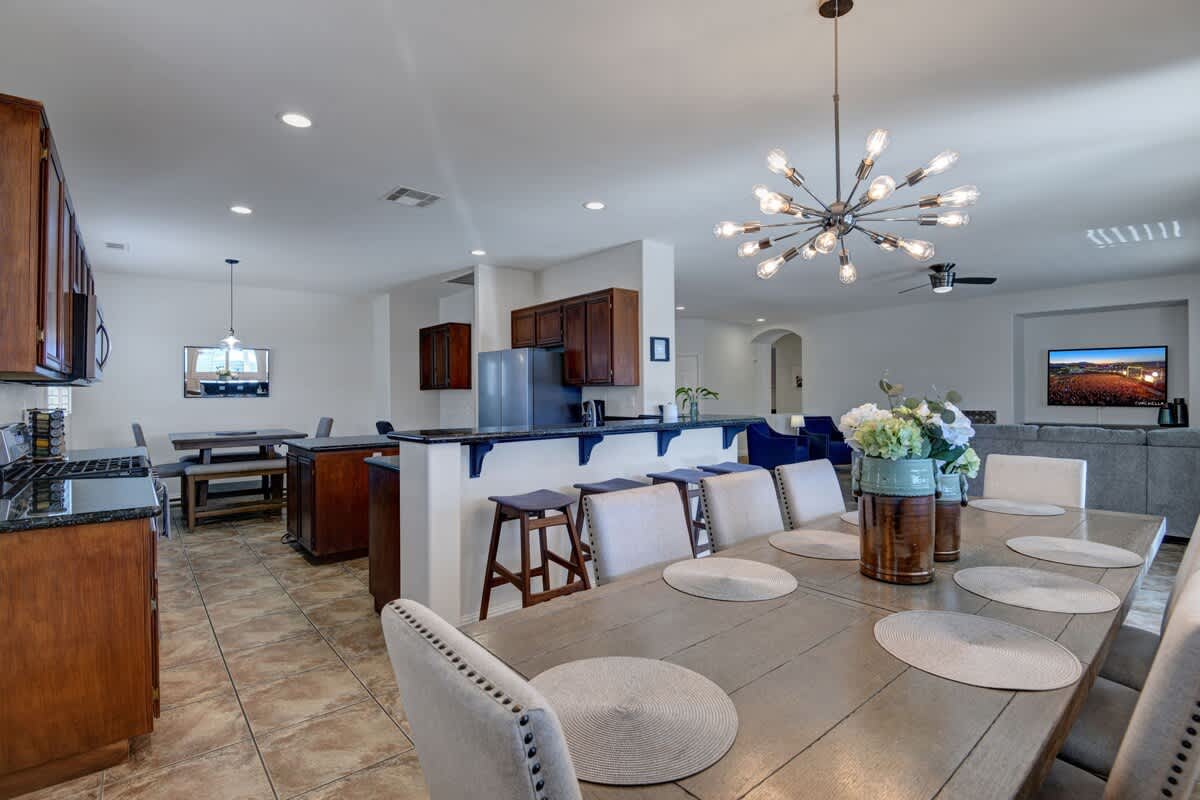 Bright open dining area with seating for the whole group.