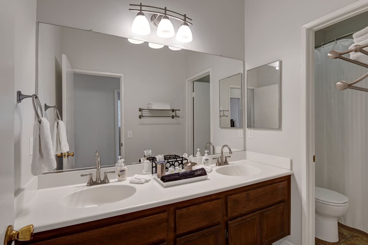 2nd sparkling clean full bathroom with double sinks. Tub and Shower.