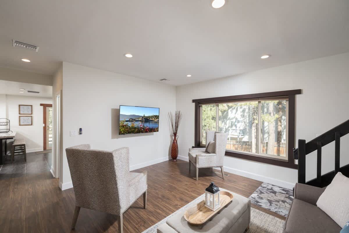TV area next to grand living area.