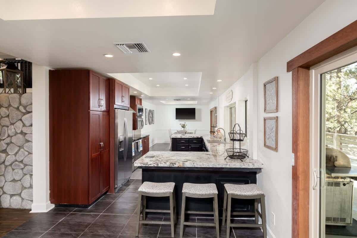 Huge and fully equipped granite kitchen.