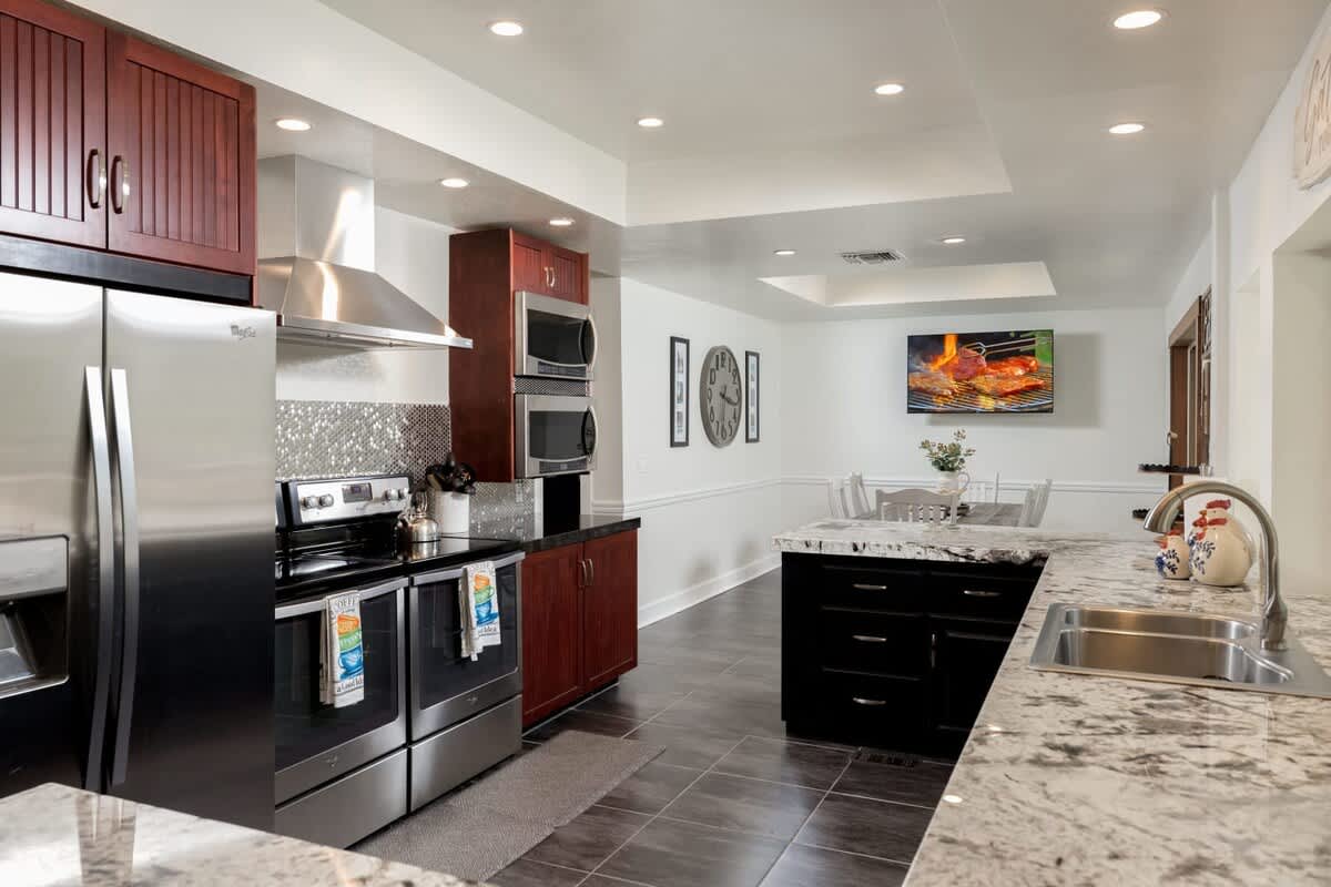 Stainless steel appliances. Sink views of Huge Pines