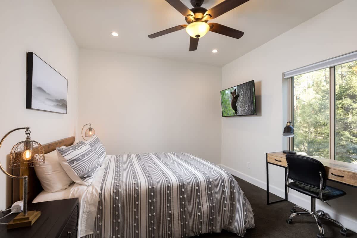 3rd bedroom upstairs with LCD TV and Desk